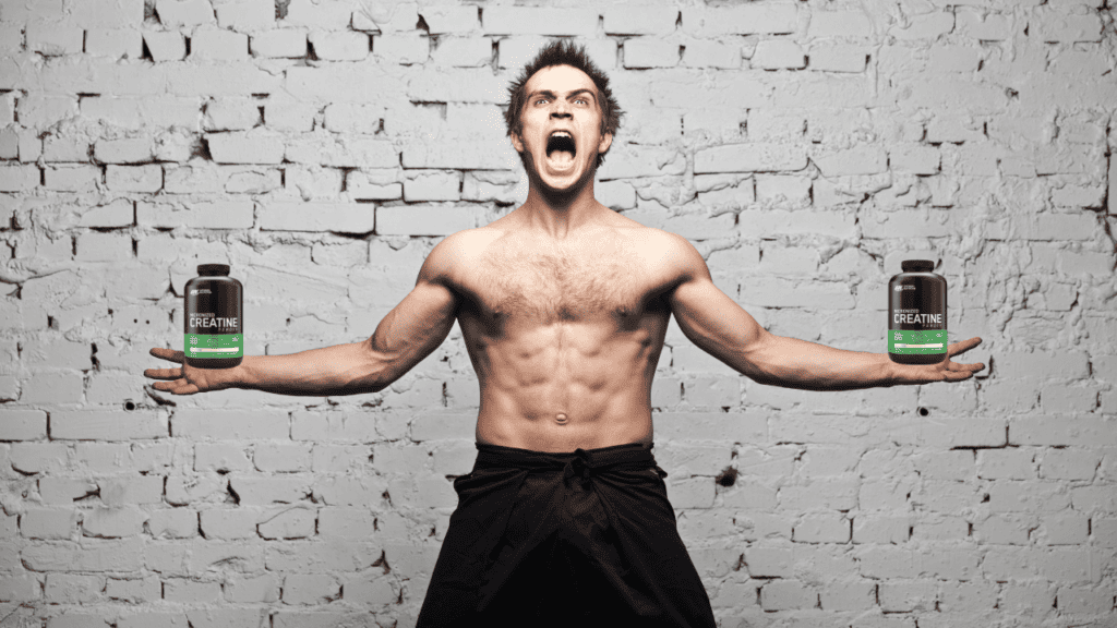image of a fit man that's holding creatine