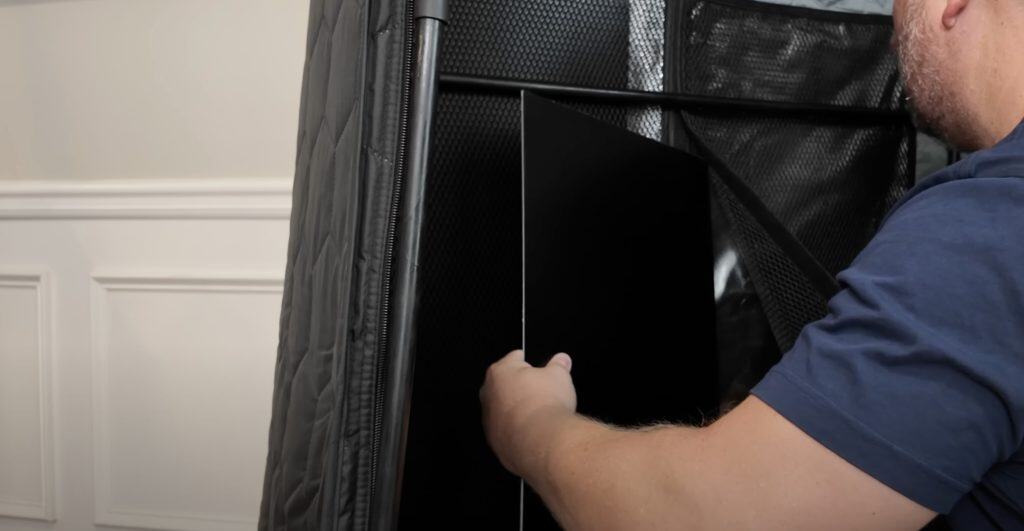 Image of a person assembling the SaunaBox Pulse Pro